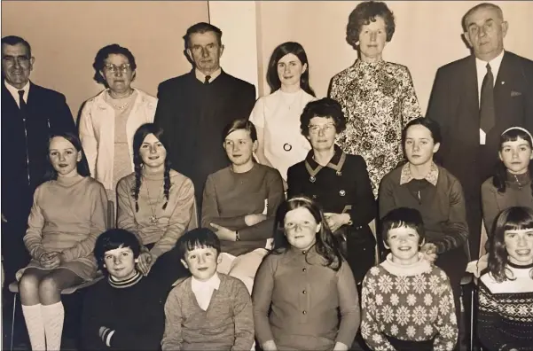  ??  ?? Pictured at the retirement in 1968 of Mrs M. O’Connor from teaching at Monksland National School in Cooley are parents and pupils.