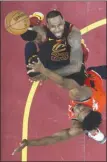  ?? The Associated Press ?? Cleveland Cavaliers’ LeBron James shoots over Toronto Raptors’ OG Anunoby during Game 4, Monday.