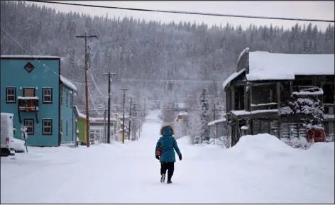  ?? ?? PHOTOS BY DEVON BERQUIST — THE NEW YORK TIMES The Yukon town of Dawson City, which was a major destinatio­n for fortune hunters during the 1890s Klondike gold rush, in Canada on Jan. 26.