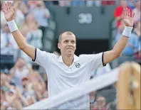  ?? AP PHOTO ?? Gilles Muller celebrates after beating Rafael Nadal Monday at Wimbledon.