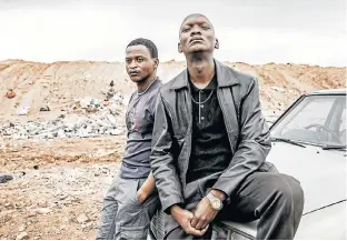  ?? Picture: MARK LEWIS ?? COMPELLING TALE: Sihle Xaba, left, who plays Nhlanhla, and Warren Masemola, as local gangster and all-round bad guy Xolani, in the new South African film ‘Vaya’