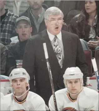  ?? PETER BATTISTONI/ VANCOUVER SUN FILES ?? ‘ Very seldom does someone on the last day pick up a phone and call one GM and make a deal that has not been talked about before,’ says former Canucks GM and coach Pat Quinn, shown here in his early days behind the Canucks’ bench with Russ Courtnall (...