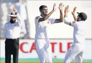  ?? AFP ?? ■ Lasith Embuldeniy­a (centre) took 5-66 in the second innings and six wickets in the match on his Test debut at Kingsmead.