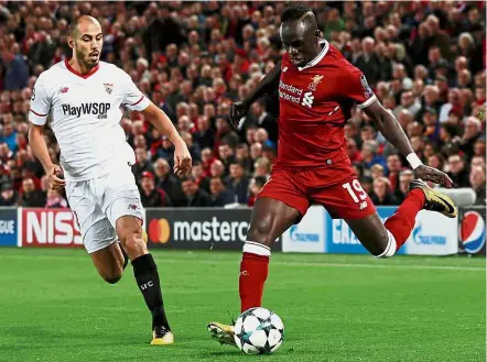  ??  ?? Still not fit: Liverpool’s Sadio Mane (right) will be out of action for the English Premier League match against arch-rivals Manchester United at Anfield today. — Reuters