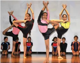  ?? — BUNNY SMITH ?? Students perform yoga at the National Yoga Olympiad in New Delhi on Wednesday, ahead of the Internatio­nal Yoga Day on Thursday.