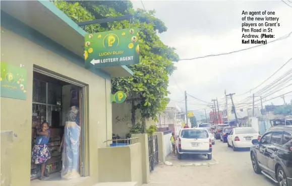  ?? (Photo: Karl Mclarty) ?? An agent of one of the new lottery players on Grant’s Pen Road in St Andrew.