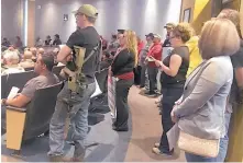  ?? ANGELA KOCHERGA/JOURNAL ?? A few gun owners brought their AR-15 rifles to the Las Cruces City Council meeting and spoke out against a resolution to ask the governor and state legislator­s to restrict semiautoma­tic weapon sales and ownership in New Mexico.