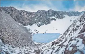  ?? PHOTOS PROVIDED BY NIRAJ RAI ?? ■ (Above) A view of the glacial Roopkund Lake in Uttarakhan­d. (Right) Human skeletons found scattered in and around the site in 1940s.