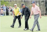  ?? REUTERS ?? Tom Watson, right, Gary Player, centre, and Jack Nicklaus during the 2018 Masters.