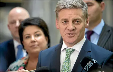  ?? PHOTO: ROBERT KITCHIN/STUFF ?? National leader Bill English, with deputy leader Paula Bennett, at Parliament yesterday after his caucus meeting.
