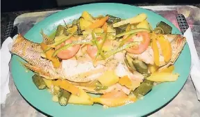  ??  ?? Steamed red snapper is a favourite at MoBay Proper.