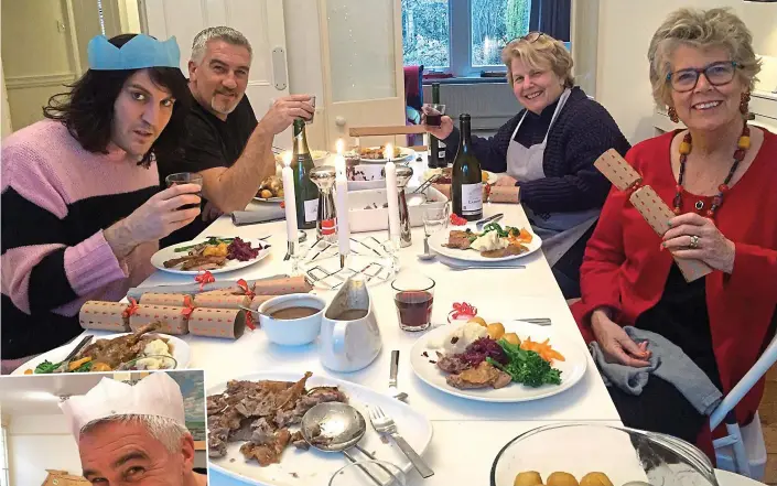  ??  ?? Great British Christmas: Noel Fielding, Paul Hollywood, Sandi Toksvig and Prue Leith enjoy their festive meal