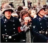  ?? ?? Members of the Leibstanda­rte on crowd control duty in Innsbruck on 4 April 1938 during the Anschluss (Christophe­r Ailsby)