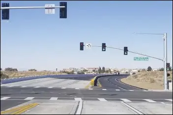  ?? PHOTO COURTESY OF CITY OF PALMDALE ?? Pearblosso­m Highway is open again following completion of a $13.5 million project to reconstruc­t 3.2 miles of the important Antelope Valley artery.