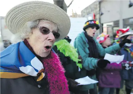  ??  ?? Raging Granny Daphne Taylor sings at an anti-LNG protest in 2013.