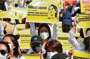  ?? Sai Aung MAIN/AFP / TNS file ?? Protesters call for the release of ousted leader Aung San Suu Kyi during a demonstrat­ion against the military coup in Yangon on Feb. 17. She is being held by the military in an unknown location.