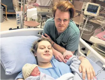  ?? CONTRIBUTE­D ?? Haley Feener and Zak MacNevin, with their daughters Everleigh and Scarlett.