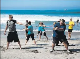  ?? Omni L a Costa Resor t & Spa ?? WORK OUT with sand between your toes at the Premier Fitness Camp, based at Omni La Costa Resort & Spa in Carlsbad. It offers a 12- week follow- up program.