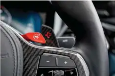  ??  ?? As in the previous-gen M3/M4, two red M buttons allow owners to save two quite distinct vehicle calibratio­n settings, avoiding the faff of tweaking on the move