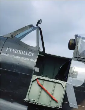  ??  ?? Note the thick, laminated, bullet-deflecting panel (mounted on the windscreen and the rearview mirror). The door was necessary for entry to the small cockpit, and the crowbar mounted in the door doubled as a canopy breaker (in case it was jammed) and as an emergency landing-gear lowering system used to break hydraulic lines under the pilot’s legs. (Photo by Dan Patterson)