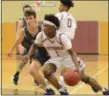  ?? THOMAS NASH - DIGITAL FIRST MEDIA ?? Pottsgrove’s Manny Clark drives the lane during the first half of Friday night’s game.