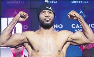  ?? GRAHAM HUGHES/THE CANADIAN PRESS ?? Light-heavyweigh­t challenger Jean Pascal of Laval flexes during the weigh-in in Montreal on Friday, ahead of his title fight against champion Sergey Kovalev from Russia on Saturday.