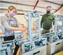  ?? ?? Advanced Manufactur­ing Centre’s team of Margaret Weir and Andy Harpur with Industry 4.0 equipment.