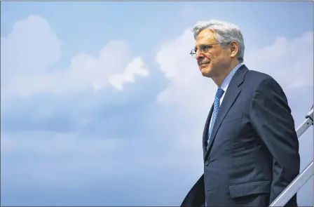  ?? SAMUEL CORUM — POOL VIA AP ?? Attorney General Merrick Garland arrives at Midway Internatio­nal Airport in Chicago, Thursday, July 22. Garland announced an initiative to reduce gun violence with five cross-jurisdicti­onal strike forces by disrupting illegal firearms traffickin­g in key regions across the United States.