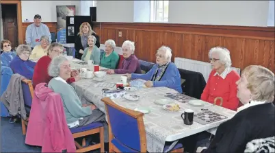  ?? 20_c17elderbe­rries03 ?? While the Courier reporter spoke to Rita, the rest of the group enjoyed a game of musical bingo with sessional workers Jim Turner and Gayle Barrett.