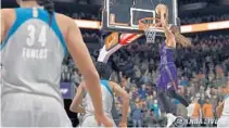  ?? COURTESY OF ELECTRONIC ARTS ?? The video game equivalent of WNBA star Brittney Griner dunks in a screen shot of NBA Live ’18, set for a September release.
