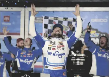  ?? AP PHOTO/JOHN RAOUX ?? Ricky Stenhouse Jr. celebrates in Victory Lane after winning the NASCAR Daytona 500 auto race at Daytona Internatio­nal Speedway, on Sunday in Daytona Beach, Fla.