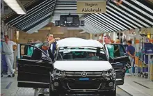  ?? AFP ?? The VW plant in Wolfsburg, Germany. Volkswagen accounted for more than one in five jobs among the group of 13 data showed.