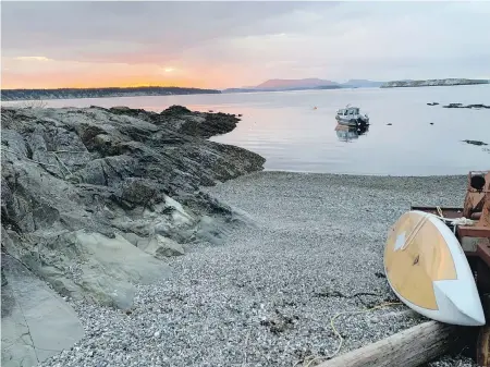  ?? TARA MARTIN ?? Sunset as seen from the northern end of SISCENEM, also known as Halibut Island.