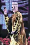  ?? PHOTO: REUTERS ?? ‘‘Too much’’ . . . Pink holds the award for outstandin­g contributi­on at the Brit Awards yesterday.