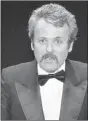  ?? Associated Press photo ?? In this March 28, 1977 file photo, William Goldman accepts his Oscar at Academy Awards in Los Angeles for screenplay from other medium for “All The President's Men.”