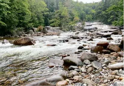  ?? CONSERVATI­ON OFFICER JON DEMLER/NEW HAMPSHIRE FISH AND GAME DEPARTMENT VIA AP ?? Franconia Brook as it flowed near Franconia Falls Aug. 15, the day a woman drowned nearby.