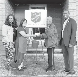  ?? Submitted Photo ?? Xi Sigma Zeta Chapter, Phi Beta Sigma Sorority, Inc recently made their annual donation to the Salvation Army. From left, Angela Wilburn, Chapter Basileus, organizer, Ashley Boone, Red Kettle Coordinato­r, Yvette Brown, Chapter Secretary and Forrest City Mayor Cedric Williams, SFC Care Center Board member.