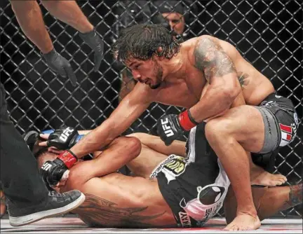  ?? PROVIDED ?? Saugerties graduate Dennis Bermudez is in control during mixed martial arts bout.