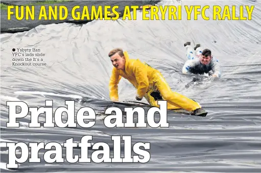  ??  ?? ● Ysbyty Ifan YFC’s lads slide down the It’s a Knockout course