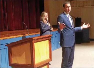  ?? EVAN BRANDT — DIGITAL FIRST MEDIA ?? U.S. Rep. Ryan Costello, R-6th Dist., answers questions at the Aug. 7, 2017, town hall meeting at Pottstown High School.