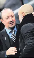  ??  ?? Embrace: Rafa Benitez and Pep Guardiola after the game