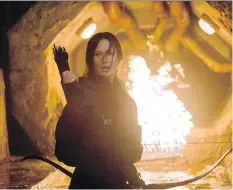  ?? MURRAY CLOSE/LIONSGATE FILMS ?? Jennifer Lawrence as Katniss Everdeen. The Hunger Games finale comes roaring down the home stretch.