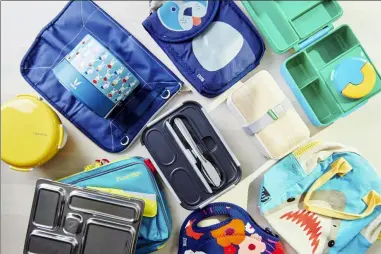  ?? CHEYENNE M. COHEN — KATIE WORKMAN VIA AP ?? This shows a collection of new lunchboxes.