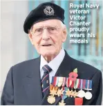  ??  ?? Royal Navy veteran Victor Chanter proudly wears his medals