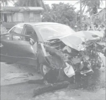 ??  ?? Avoiding horses: At least two persons had to be rushed to the hospital late Saturday afternoon after a speeding car clipped another vehicle while trying to avoid horses on the Trafalgar, West Coast Berbice road and later came to a halt after uprooting...