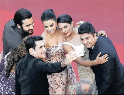  ?? PICTURE: EPA ?? COMING TO SA: (left to right) Indian producer Honey Bhagnani, director Omung Kumar, Bollywood actresses Aishwarya Rai, Richa Chadha, Indian producer Bhushan Kumar show some team spirit at the annual Cannes Film Festival in France this year.