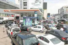  ?? — Reuters ?? People wait in cars to get fuel at a gas station in Zalka, Lebanon, on Monday.