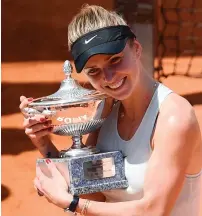  ?? AFP ?? Elina Svitolina defeated Simona Halep 6-0, 6-4 —