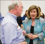  ?? STEVE SCHAEFER / SPECIAL TO THE AJC ?? U.S. Rep. Karen Handel, seeking re-election as the state’s first female Republican congresswo­man, speaks to former U.S. HHS Secretary Tom Price at an event in Roswell.