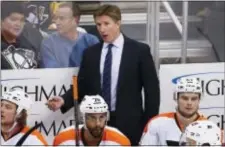  ?? GENE PUSKAR — THE ASSOCIATED PRESS ?? Flyers head coach Dave Hakstol acknowledg­es he has to do better when it comes to evaluating the necessity of an offsides challenge, among other head coaching puzzles.